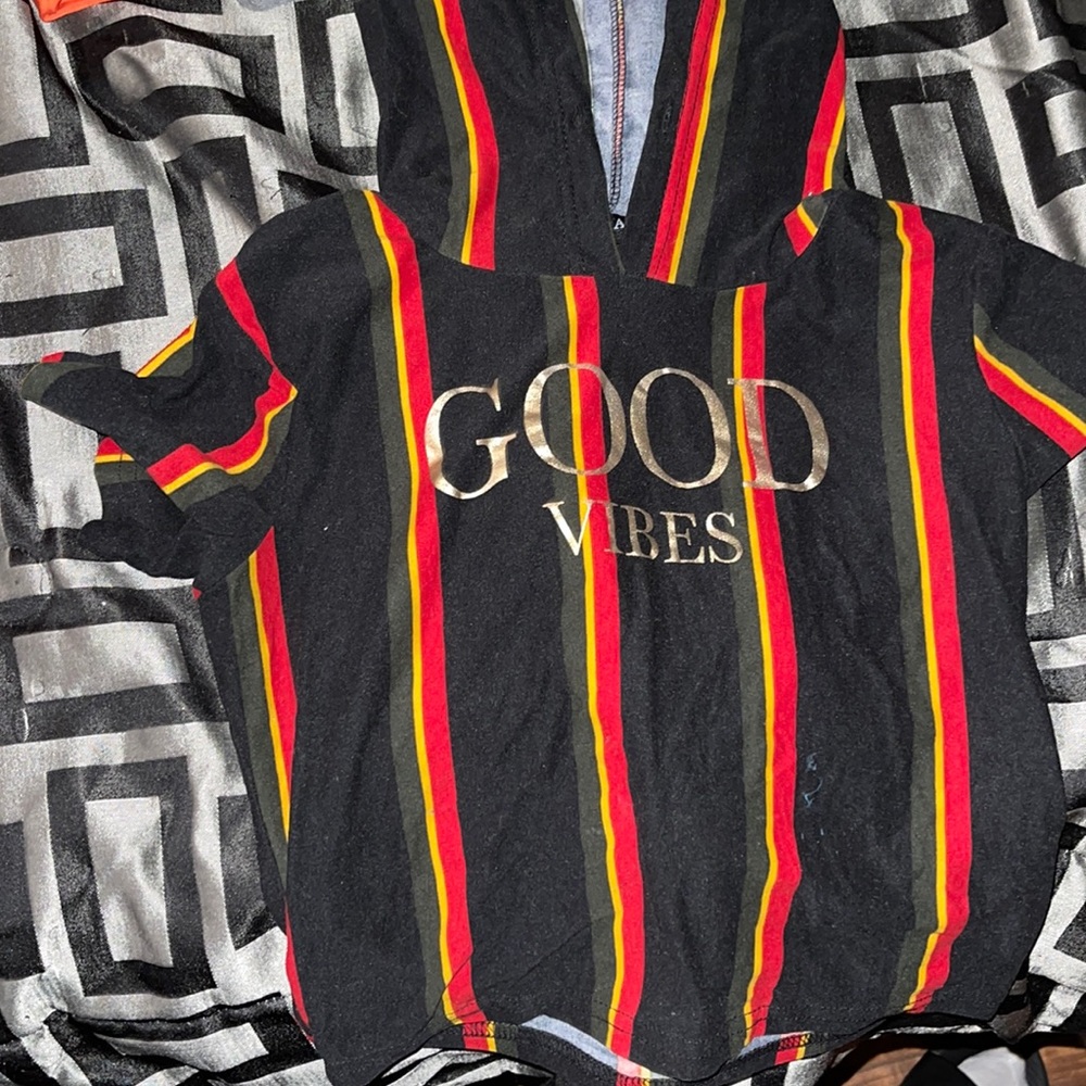 Red,black,yellow,and dark green hoodie short sleeve crop top.